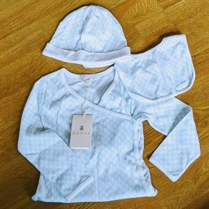 Gucci baby onsie set.